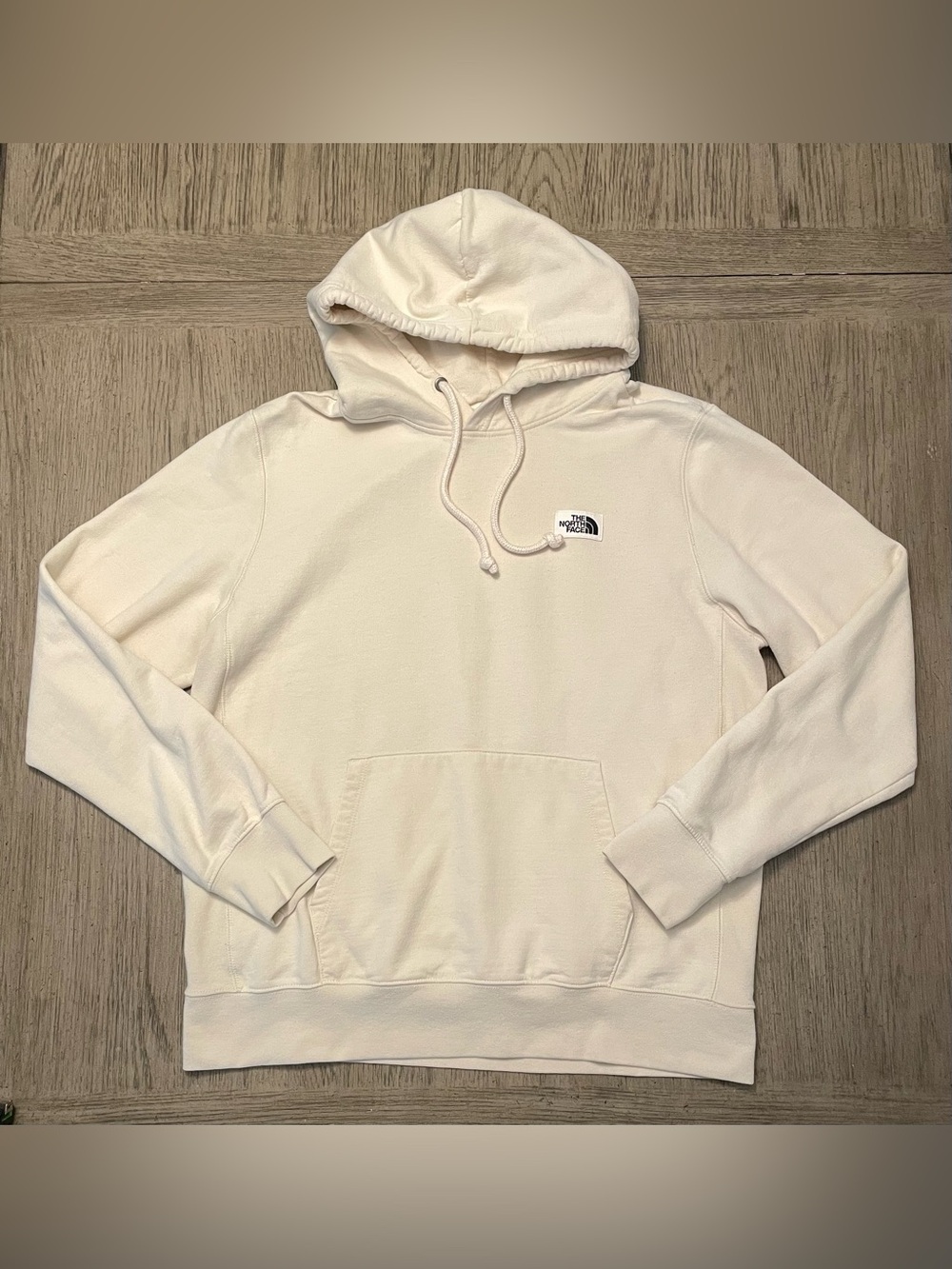 The North Face men’s ivory hoodie, L, excellent condition. Approx 22”x26”